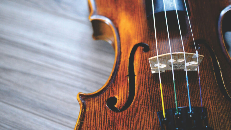 Close up photo of a violin on its back