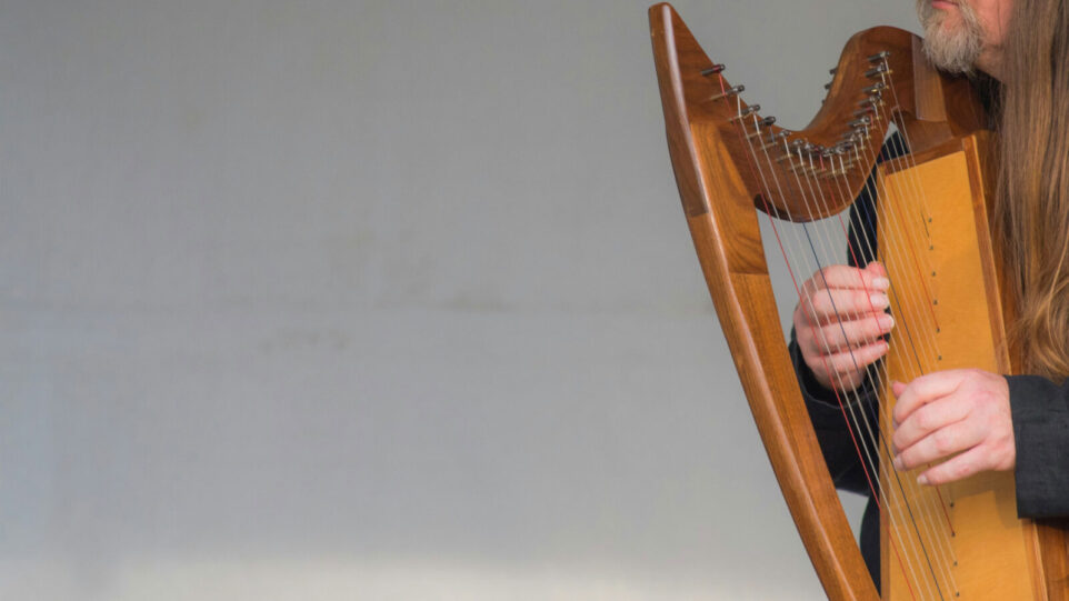 Man playing the Harp