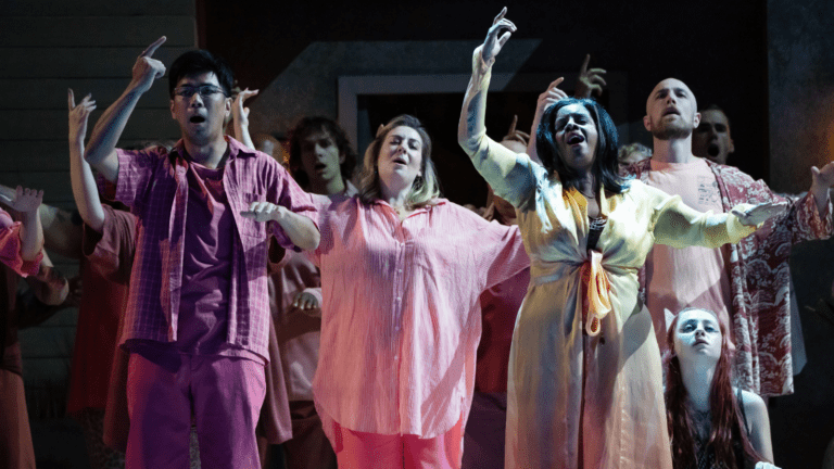 Multiple figures in pink, fuchsia, or rose colored casual attire, seeming to be dancing in a reverie with their right arms gesturing upwards.