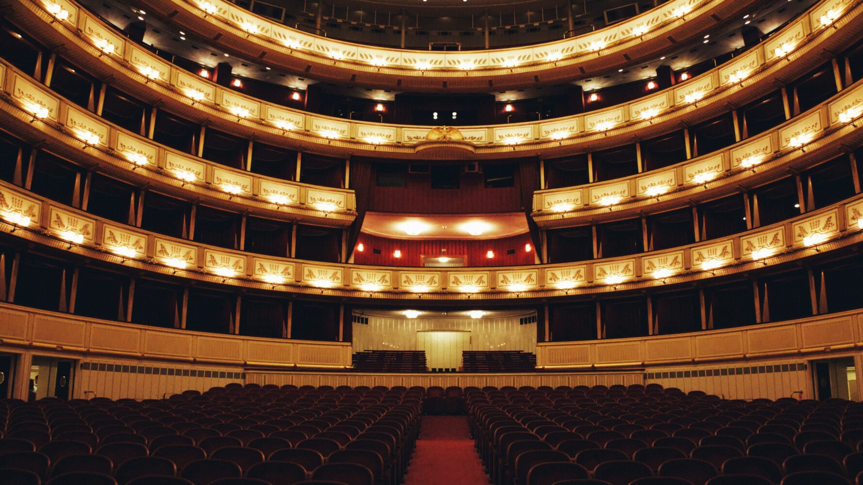 Luxurious gold and red velvet opera house interior
