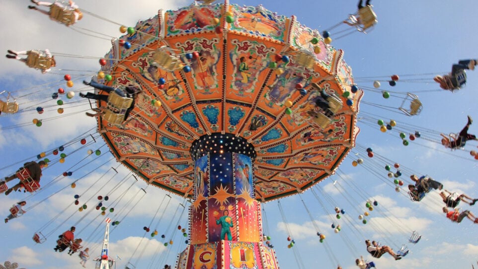 multicolored flying chair amusement park ride