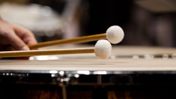 close up of timpani instrument and mallets