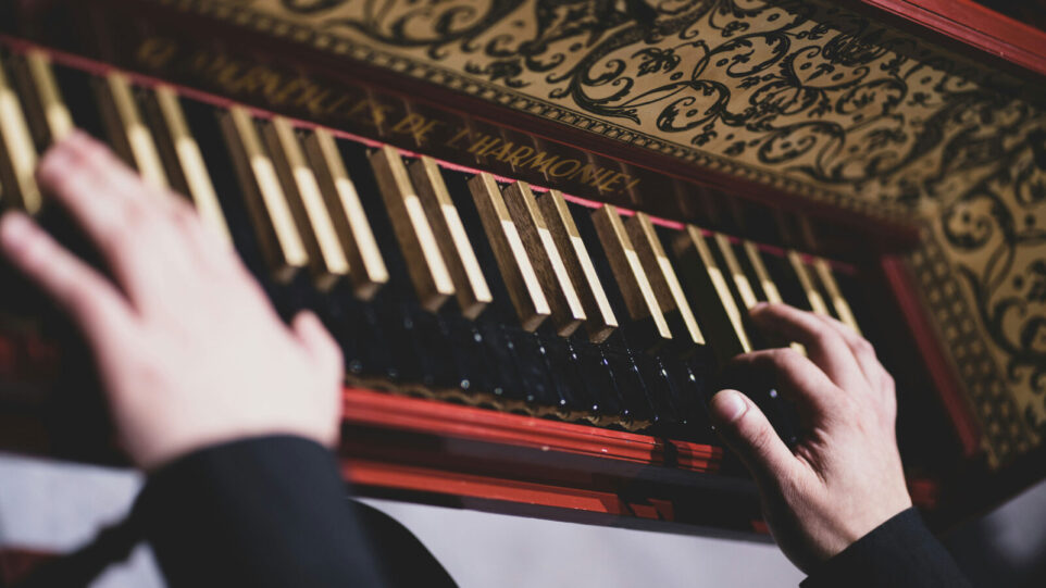 A Pianist playing a beautiful vintage keyboard