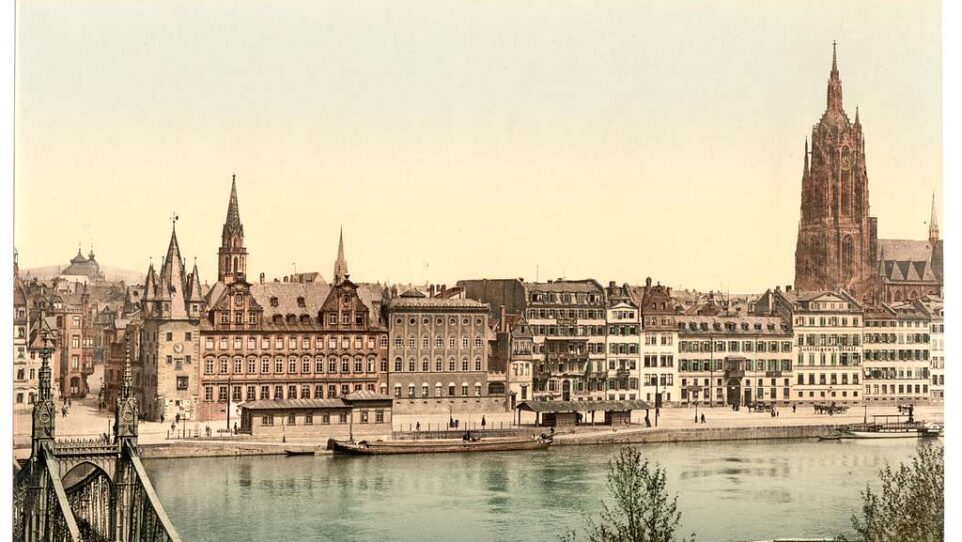 vista of a late 19th century city on a lake