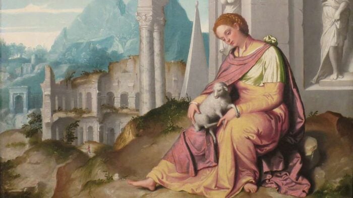 a young girl of 12 or 13 dressed in clothing from the 4rth century, sits on a hillside holding a baby lamb