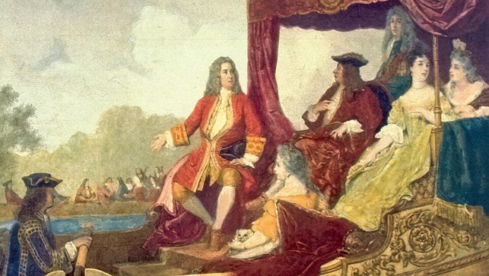 Painting of George Frideric Handel (left, with right arm extended) with King George I of Great Britain, traveling by barge on the Thames River while musicians play in the background. The painting is an artist's rendering of the first performance of Handel's Water Music in 1717.