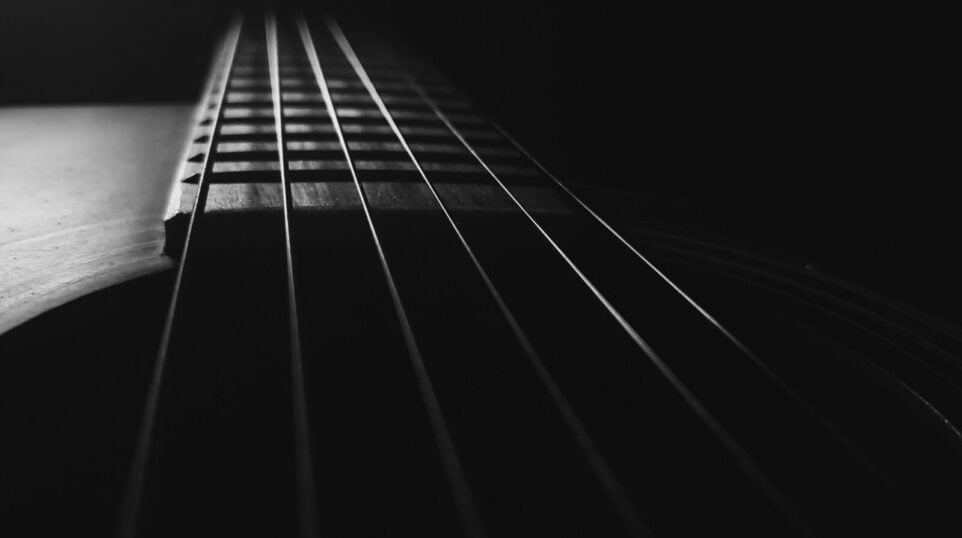 Guitar on its back in black and white