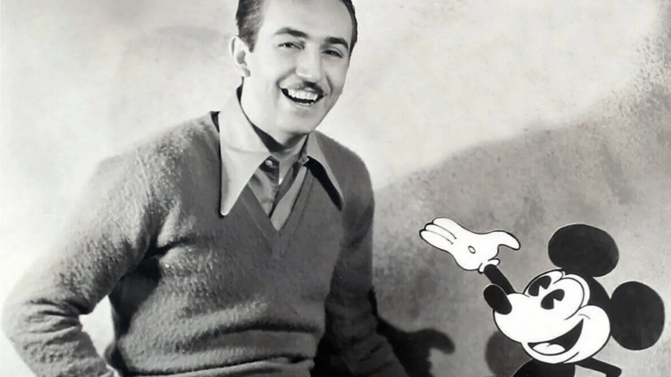 smiling young man with cartoon mouse