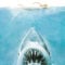 closeup of Jaws poster features woman swimming in open water... with shark lurking below